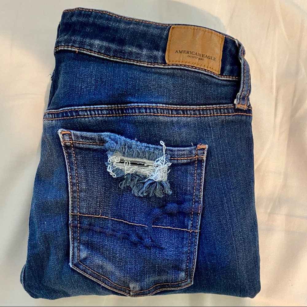 AE AMERICAN EAGLE JEGGING RIPPED JEANS